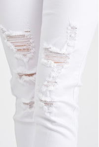 The Mid-Rise Ripped Up White Jeans